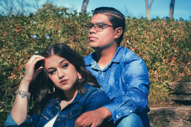 Couple Sitting Outdoors