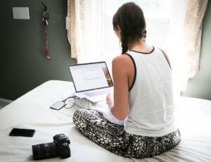 female student studying on laptop