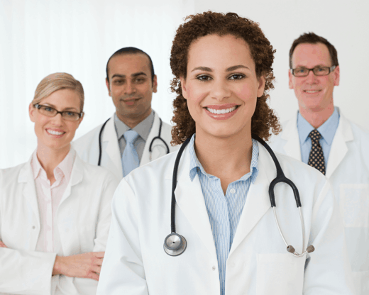 group of smiling physicians