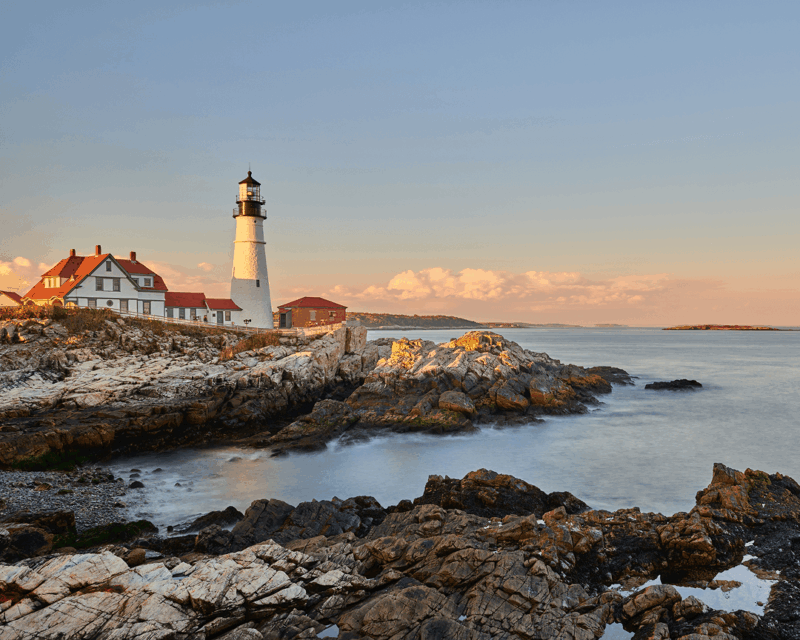 maine shoreline and lighthouse
