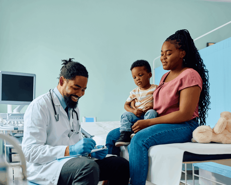 mother and child with pediatrician
