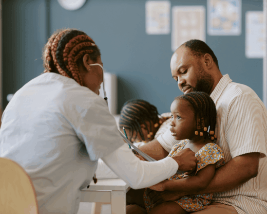 parent and child with doctor
