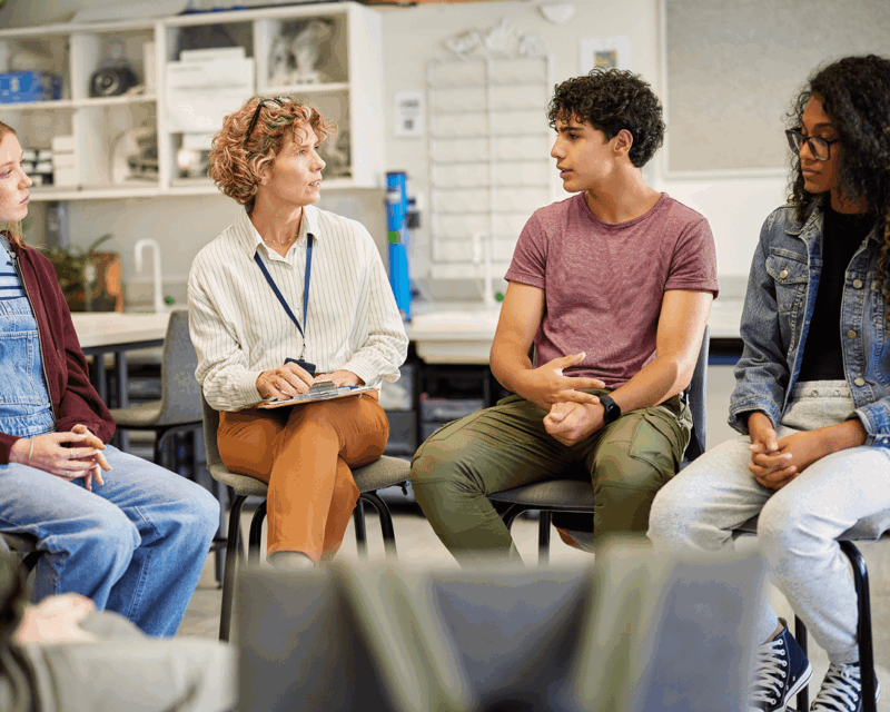 teenager in group theraphy